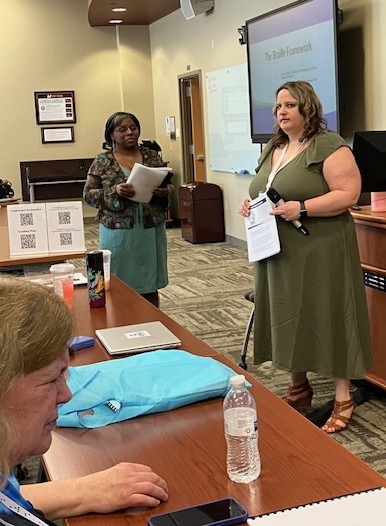 Jessie and Bianca presenting on the Braille framework